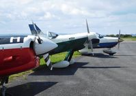  - Visiting aircraft at the airport. - by Roger Winser