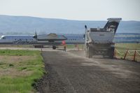  - Flagman at work stopping trucks during construction in May 2014. - by Gerald Howard