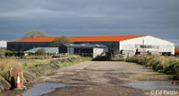  - Old hangars on north side of Dunkeswell airfield now used as commercial/industrial premises - by Clive Pattle