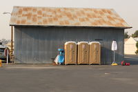  - PortaPotties and sanitation wash stand-these are liberally positioned about the SZP Thomas Fire FireBase airport areas. - by Doug Robertson