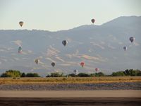  - Ballons on the rise again. The wind normally keeps them north of the airport. - by Gerald Howard