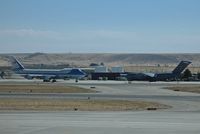  - Air Force One taxiing out past C-17A support aircraft. - by Gerald Howard