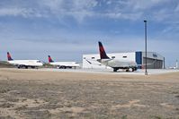  - Three Embraer  Embraer ERJ-175LL parked on the Skywest Maintenance hanger ramp awaiting their turn. - by Gerald Howard