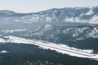  - South Lake Tahoe airport facing SW. The approach is tricky getting into KTVL because the mountains are in such close proximity to the airport. - by Chris Leipelt