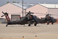  - AH-64s from the Royal Singapore Air Force parked on the Idaho ANG ramp. At BOI for training. - by Gerald Howard