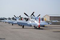  - P-51 & P-40 aircraft parked on airshow ramp. - by Gerald Howard
