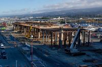  - Tram being built for long term and rental car parking areas. SFO 2018. - by Clayton Eddy