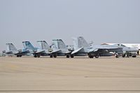  - F/A-18s from VMFAT-101 and VFA-106 parked on the north GA ramp. - by Gerald Howard