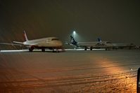  - Aircraft parked waiting for a gate to open. - by Gerald Howard