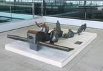  - sculpture 'Vor dem Start in Calais zum Europarundflug 1911 wartet die Mannschaft auf ein Zeichen des Piloten, das Flugzeug loszulassen' (at the take off in Calais 1911 the crew awaits a signal of the pilot to let go) 1983 by K. Biederbick at BER airport - by iwarnecke
